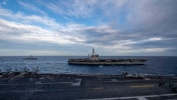 美军罗斯福号航母(USS Theodore Roosevelt) 与尼米兹号(USS Nimitz)航母2021年2月9日在南中国海举行双航母联演(美国海军照片)
