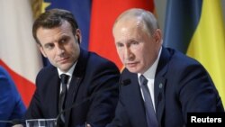 俄罗斯总统普京与法国总统马克龙。(路透社2019年12月9日)