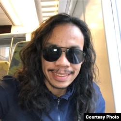 位于印尼北苏门答腊省棉兰市社区法律服务机构 “BAKUMSU”执行董事东加姆·邦加比(Tongam Panggabean) (照片提供:邦加比)