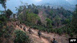 ရှမ်းပြည်မြောက်ပိုင်း နန့်ဆန်မြို့နယ်အနီးမှာ ကင်းလှည့်နေတဲ့ TNLA တအာန်းတပ်မတော် စစ်သားများကိုတွေ့ရစဉ် (မတ် ၉၊ ၂၀၂၃)