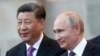 资料照片:中国国家主席习近平和俄罗斯总统普京。(2019年6月5日)