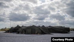 美国海军陆战队照片显示,在“利刃24”双边指挥所演练期间,美国海军陆战队员在日本汉森营从一出作战行动中心执行指控与控制任务。(2024年2月8日)