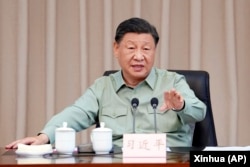 中国领导人习近平在广东湛江视察南部战区海军司令部时讲话。(2023年4月11日)