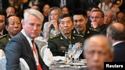 资料照:中国防长李尚福(中)在新加坡出席香格里拉对话。(2023年6月2日)