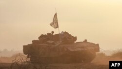 ဂါဇာကမ်းမြှောင်ဒေသ အစ္စရေးနယ်စမ်မှာတွေ့ရတဲ့ အစ္စရေးတင့်ကား (ဖေဖော်ဝါရီ ၁၂၊ ၂၀၂၄)