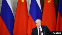 资料照:俄罗斯总统普京与中国领导人习近平在俄罗斯克里姆林宫举行会谈。(2023年3月21日)