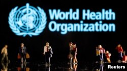 资料照:世卫组织标识与人像图示