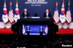 资料照:韩国总统尹锡悦与到访的美国总统拜登在首尔举行联合记者会。(2022年5月21日)