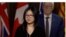Cô Katherine Đổng, con gái ông Đổng Quảng Bình, phát biểu tại cuộc họp báo ở Quốc hội Canada, bên cạnh là luật sư nhân quyền Alex Neve, ngày 17/11/2022. Photo CPAC via YouTube Canada Info.