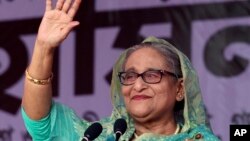 ဘင်္ဂလားဒေ့ရှ်နိုင်ငံ အာဏာရ Awami League ပါတီဝန်ကြီးချုပ် ရှိတ် ဟာစီနာ လာမယ့်ရွေးကောက်ပွဲအတွက် မဲဆွယ်စည်းရုံးရေးဆင်းနေစဥ်။(ဒီဇင်ဘာ ၂၀၊၂၀၂၃)