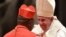 Papa François (D) ayambi episkopo ya lokumu ya diocèse ya Kinshasa Fridolin Ambongo na milulu mya "bokelami" bwa ye bo' cardinal, na Vaticain, Rome, 5 sanza ya zomi 2019. (Photo by Tiziana FABI / AFP)