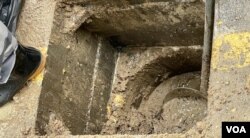 香港受世纪大暴雨侵袭,地下渠道布满泥泞 (美国之音/汤惠芸)