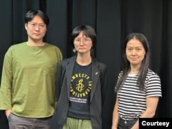 位于台北的国际特赦组织台湾分会秘书长邱伊翎(居中者)(照片提供:邱伊翎)