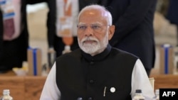 FILE - Indian Prime Minister Narendra Modi takes part in a working session on Artificial Intelligence (AI), Energy, Africa-Mediterranean during the G7 Summit in Savelletri near Bari, Italy, on June 14, 2024.