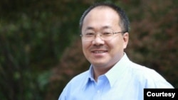 中国光明日报评论部副主任董郁玉 (照片来自网络)