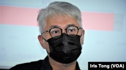 黄伟国表示,警方高调拘捕前职工盟总干事邓燕娥及前支联会副主席何俊仁,可能是在社会上制造白色恐怖 (美国之音/汤惠芸)