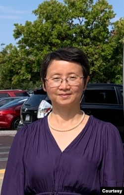 丁家喜的妻子罗胜春