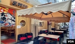 香港政府禁止日本10都县水产进口一星期,8月31日下午两点,铜锣湾一带的日式餐厅客人不多 (美国之音/汤惠芸)