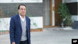 资料照:中国病毒学家张永振在上海。(2020年12月13日)