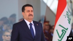 资料照片:2024年1月9日,伊拉克总理苏达尼在巴格达。(美联社照片)