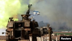加沙边境附近的一支以色列炮兵部队。(2023年12月12日)