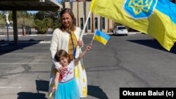 Олімпійська чемпіонка України з фігурного катання 1994 року Оксана Баюл з донькою Софією