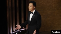 港区中国全国政协委员甄子丹2023年3月12日出席奥斯卡金像奖颁奖典礼。(路透社)