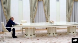 Доцільність перемовин з російським президентом Путіним обговорювали під час дискусії в університеті Джорджтаун. Фото: Sputnik, Kremlin Pool Photo via AP, File