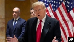 前总统特朗普2024年3月25日在纽约曼哈顿刑事法院预审听审结束后,在华尔街40号举行的新闻发布会上讲话。