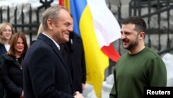 2024年1月22日,乌克兰总统泽连斯基在基辅会见波兰总理图斯克。(路透社照片)