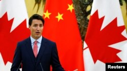 资料照片:加拿大总理贾斯汀·特鲁多在中国北京人民大会堂举行的联合新闻发布会上。(2016年8月31日)