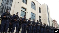 Military forces stand outside of the National Palace prior to El Salvador's President Nayib Bukele's inauguration for a second term in San Salvador, El Salvador, June 1, 2024.