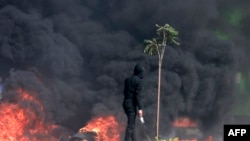 巴勒斯坦人在西岸占领区犹太定居点附近同以色列军人发生冲突。(2023年10月13日)