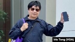 李解新被指街头演奏《愿荣光归香港》,被法庭裁定7项无牌演奏等传票控罪成立,判监30日,获准保释等候上诉 (美国之音/汤惠芸)