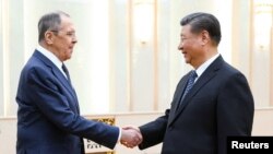 习近平2024年4月9日在北京会见俄罗斯外长拉夫罗夫。