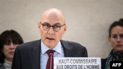 资料照片:2024年2月29日,联合国人权事务高级专员福尔克尔·蒂尔克在日内瓦举行的人权理事会第55届会议上作报告。(法新社照片)