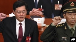 中国前外长秦刚和前国防部长李尚福(资料照)