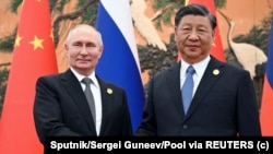 资料照片:俄罗斯总统普京在北京会晤中国国家主席习近平。(2023年10月18日)