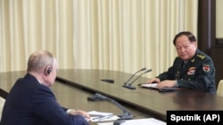 俄罗斯总统普京在莫斯科会见中共中央军委副主席张又侠。(2023年11月8日)