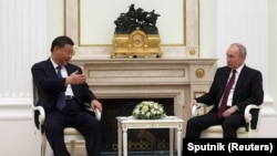 俄罗斯总统普京在莫斯科克里姆林宫会见到访的中国领导人习近平。(2023年3月20日)