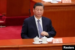 中国领导人习近平在北京人大会堂出席全国政协会议开幕式。(2024年3月4日)