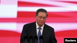 中国总理李强在北京举行的中国国际供应链促进博览会开幕式上讲话。(2023年11月28日)