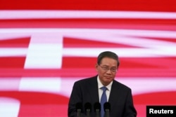 中国总理李强在北京举行的中国国际供应链促进博览会开幕式上讲话。(2023年11月28日)