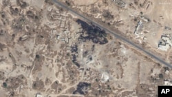 This Jan. 12, 2024, satellite image provided by Maxar Technologies shows damage from airstrikes on a radar site at Sanaa Airport in Yemen.