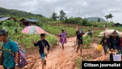 ကရင်နီဒေသ ဒီးမော့ဆိုမှာ ရေကြီးရေလျှံလို့ ဘေးလွတ်ရာသွားနေရ (စက်တင်ဘာ ၂၀၁၄)