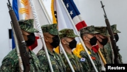 美国、菲律宾、日本和韩国在菲律宾达义市举行联合军演开幕式。(路透社2022年10月3日)