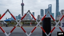 资料照:从上海外滩遥望陆家嘴。(2022年6月10日)