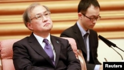 时任日本副外相的秋叶刚男2018年8月访问北京。(媒体联访照片)