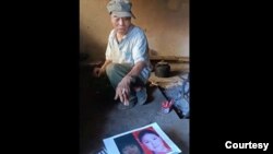 小花梅舅舅说这两张照片都不是小花梅。(取自赵兰健所摄视频)