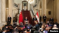 2024年1月14日,埃及外交部长舒克里与中国外交部长王毅在埃及开罗举行记者会。(路透社)